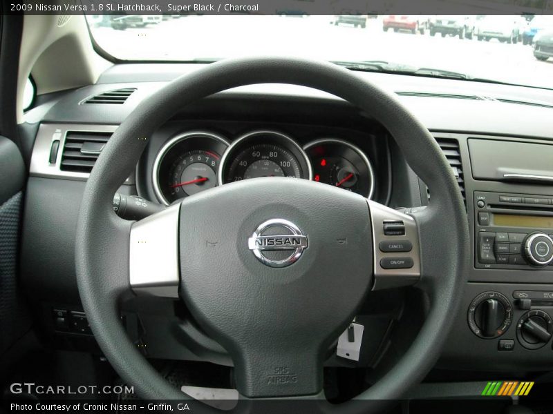 Super Black / Charcoal 2009 Nissan Versa 1.8 SL Hatchback