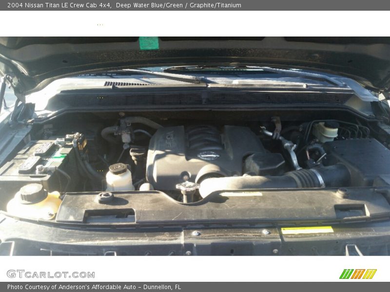 Deep Water Blue/Green / Graphite/Titanium 2004 Nissan Titan LE Crew Cab 4x4