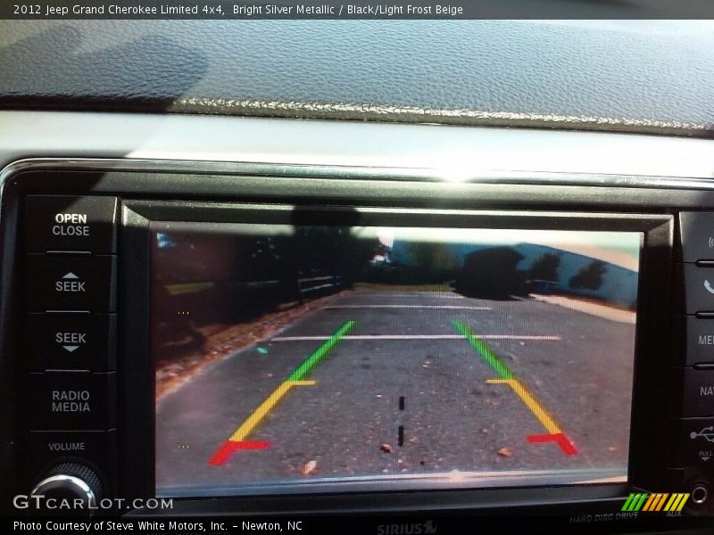 Bright Silver Metallic / Black/Light Frost Beige 2012 Jeep Grand Cherokee Limited 4x4
