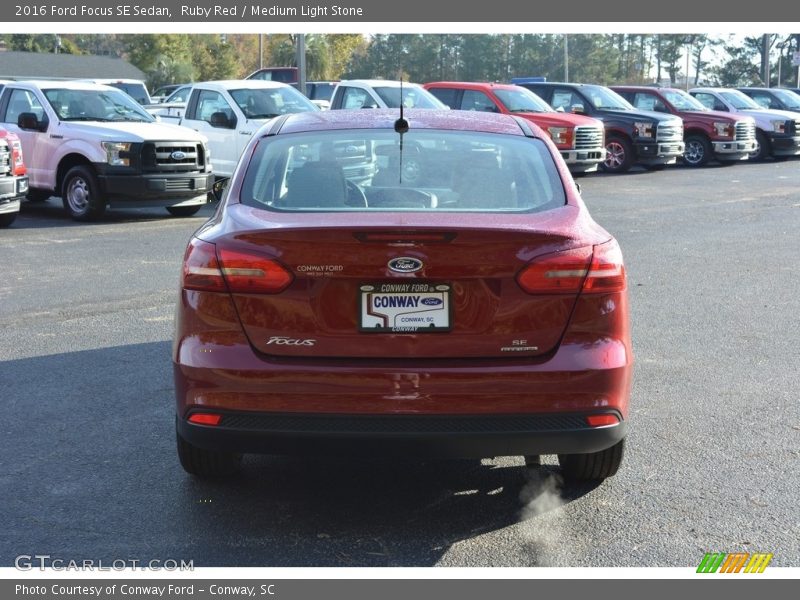 Ruby Red / Medium Light Stone 2016 Ford Focus SE Sedan