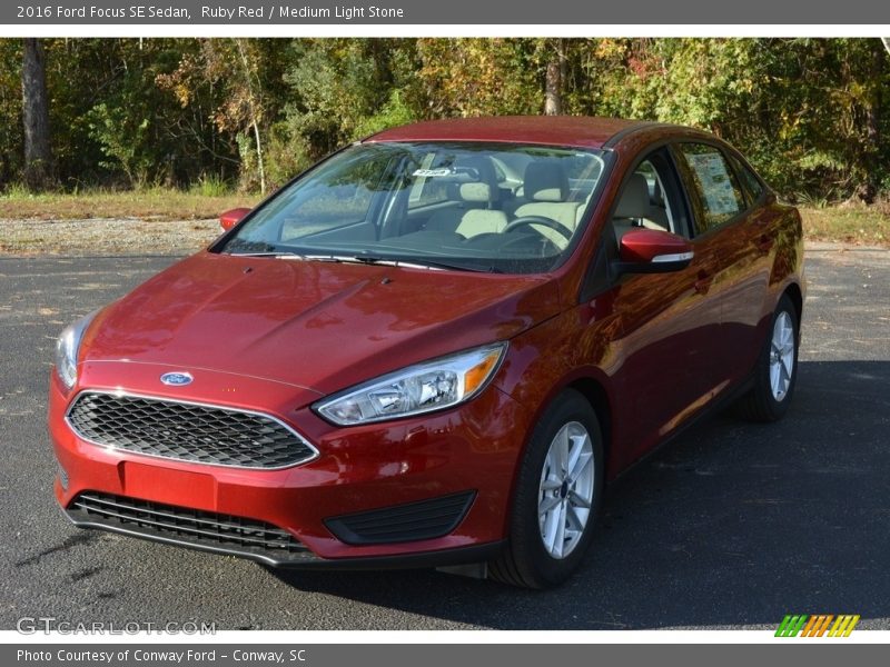 Ruby Red / Medium Light Stone 2016 Ford Focus SE Sedan
