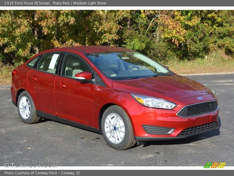 Ruby Red / Medium Light Stone 2016 Ford Focus SE Sedan