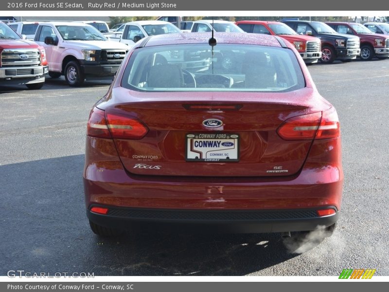 Ruby Red / Medium Light Stone 2016 Ford Focus SE Sedan