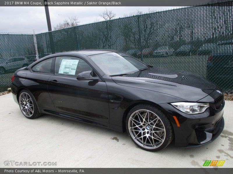 Black Sapphire Metallic / Sakhir Orange/Black 2017 BMW M4 Coupe