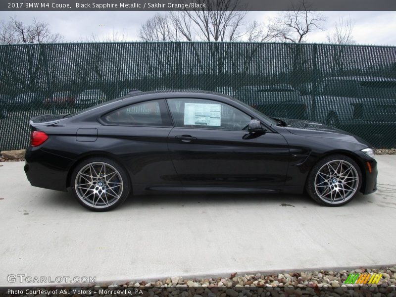 Black Sapphire Metallic / Sakhir Orange/Black 2017 BMW M4 Coupe