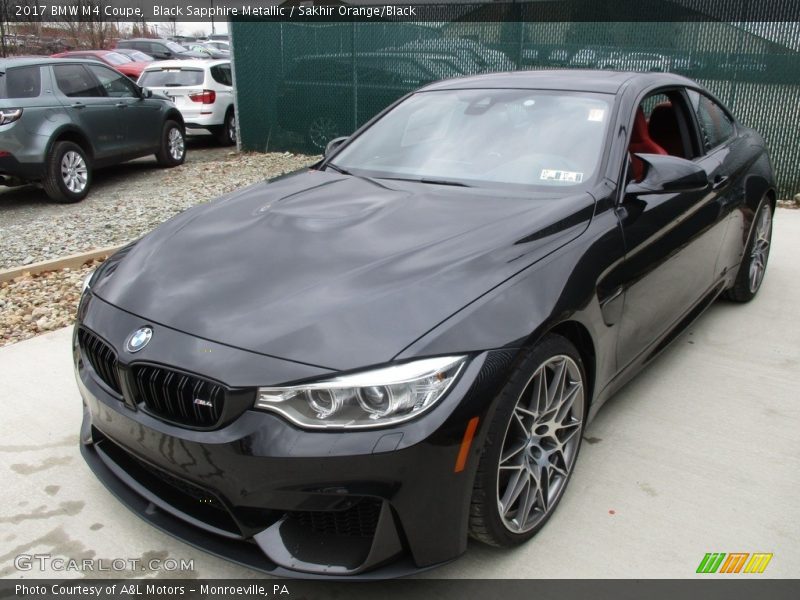 Black Sapphire Metallic / Sakhir Orange/Black 2017 BMW M4 Coupe