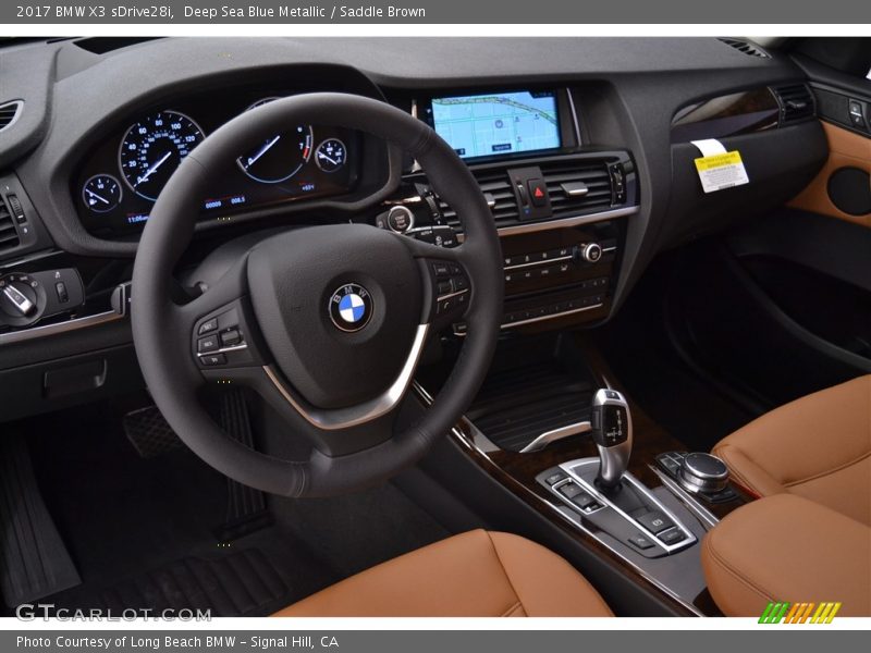 Deep Sea Blue Metallic / Saddle Brown 2017 BMW X3 sDrive28i