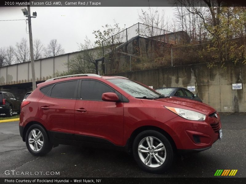 Garnet Red / Taupe 2010 Hyundai Tucson GLS AWD