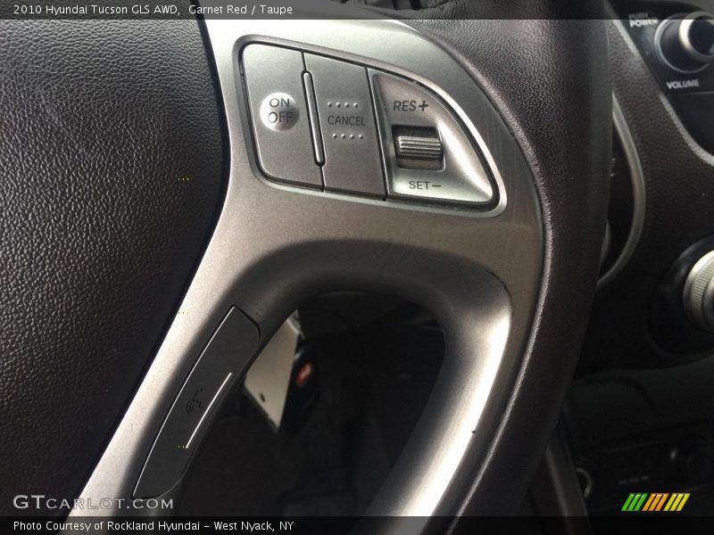 Garnet Red / Taupe 2010 Hyundai Tucson GLS AWD