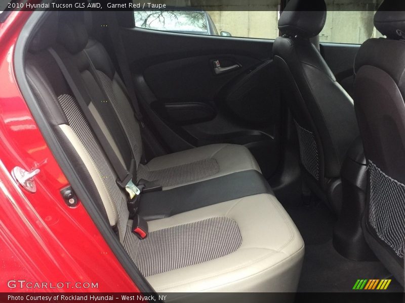 Garnet Red / Taupe 2010 Hyundai Tucson GLS AWD