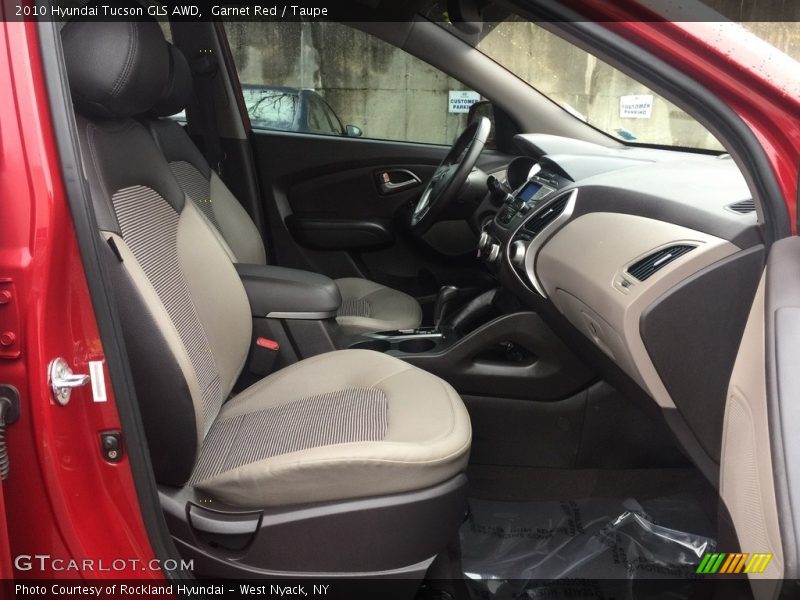 Garnet Red / Taupe 2010 Hyundai Tucson GLS AWD
