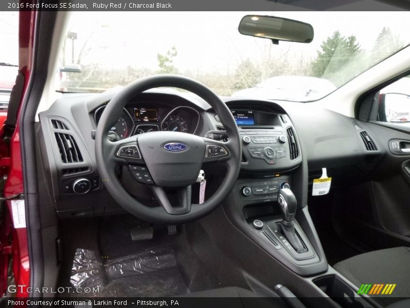 Ruby Red / Charcoal Black 2016 Ford Focus SE Sedan