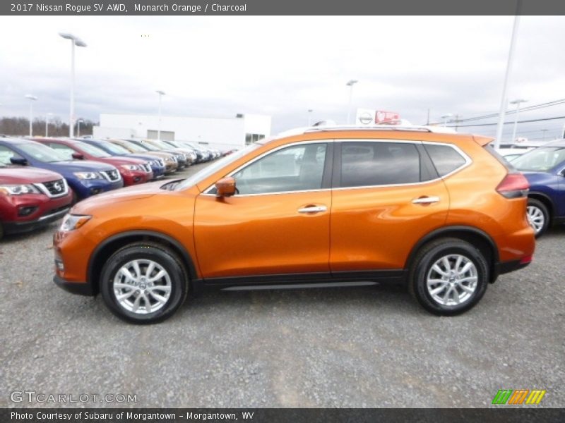 Monarch Orange / Charcoal 2017 Nissan Rogue SV AWD