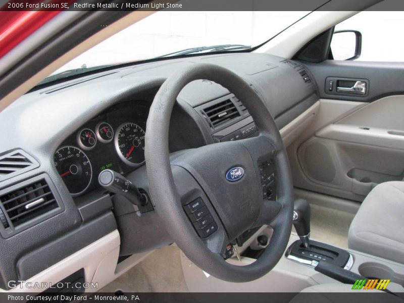 Redfire Metallic / Medium Light Stone 2006 Ford Fusion SE