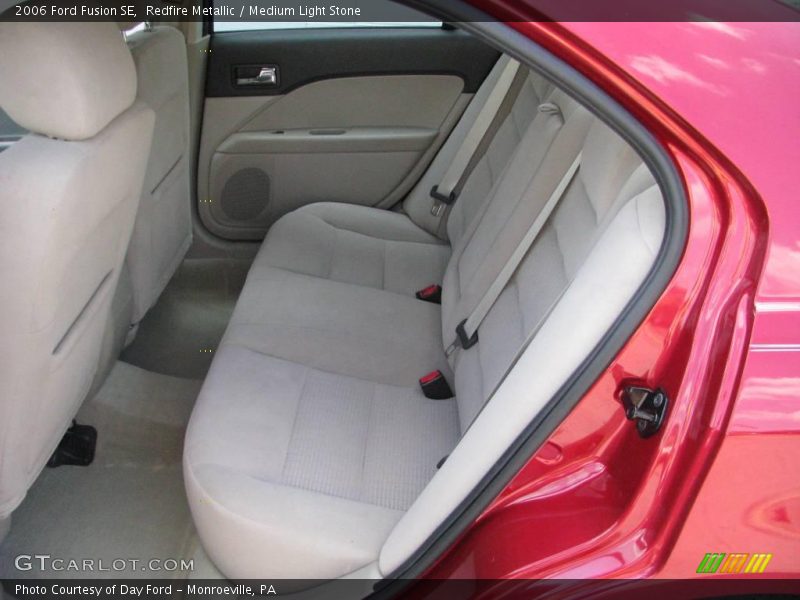 Redfire Metallic / Medium Light Stone 2006 Ford Fusion SE