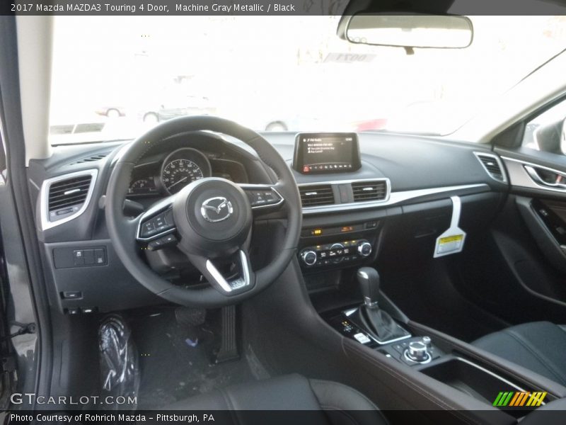 Machine Gray Metallic / Black 2017 Mazda MAZDA3 Touring 4 Door