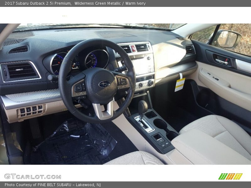 Wilderness Green Metallic / Warm Ivory 2017 Subaru Outback 2.5i Premium