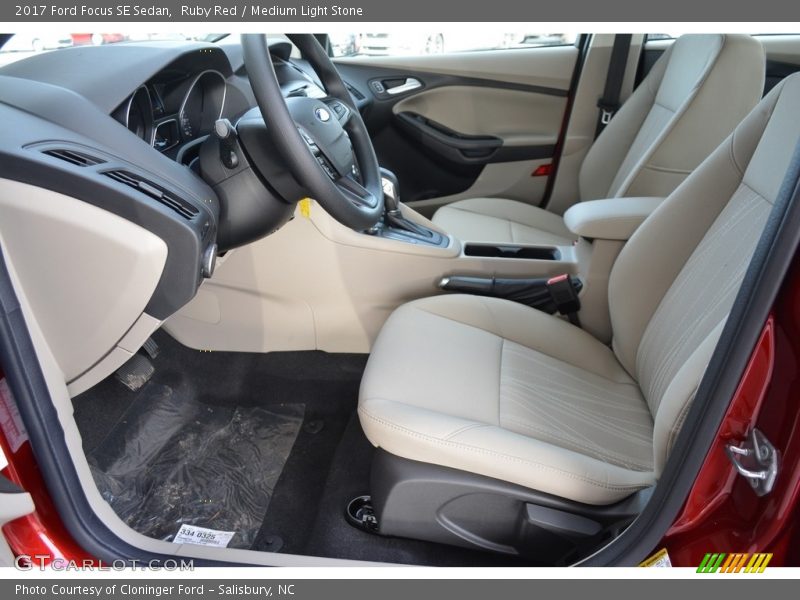 Ruby Red / Medium Light Stone 2017 Ford Focus SE Sedan