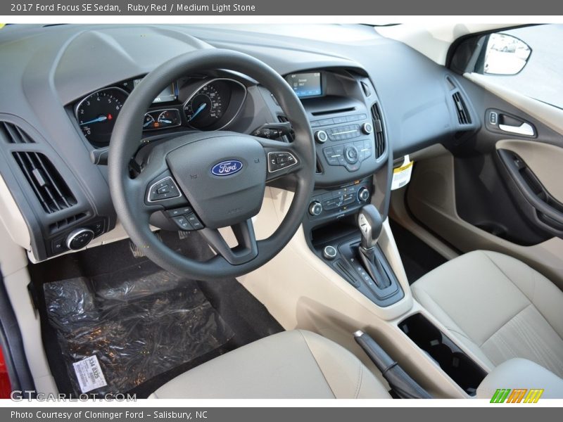 Ruby Red / Medium Light Stone 2017 Ford Focus SE Sedan