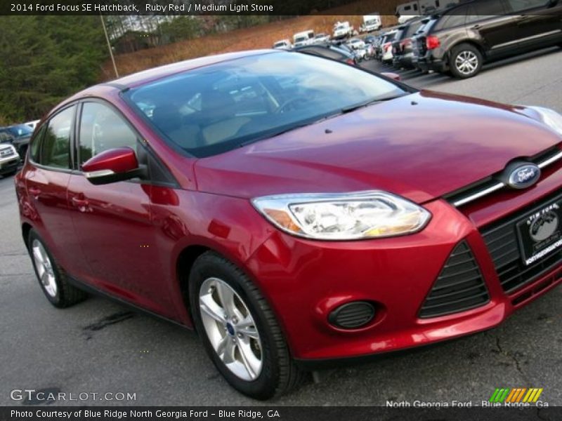 Ruby Red / Medium Light Stone 2014 Ford Focus SE Hatchback