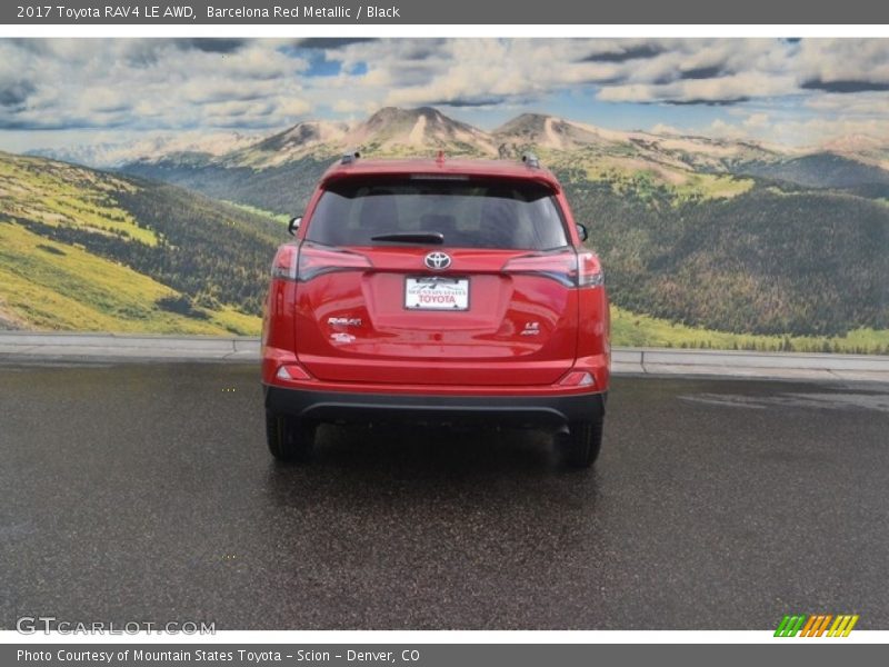 Barcelona Red Metallic / Black 2017 Toyota RAV4 LE AWD