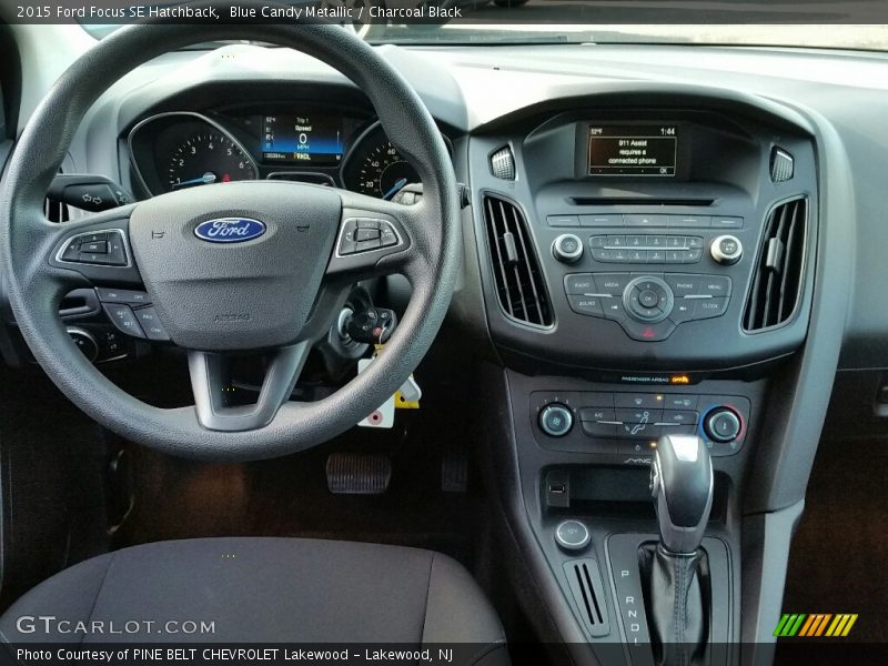Blue Candy Metallic / Charcoal Black 2015 Ford Focus SE Hatchback