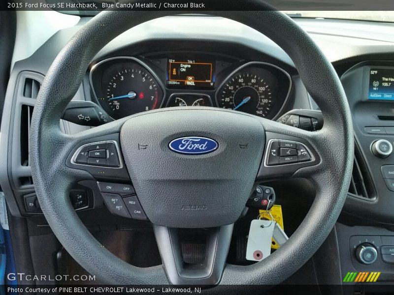 Blue Candy Metallic / Charcoal Black 2015 Ford Focus SE Hatchback