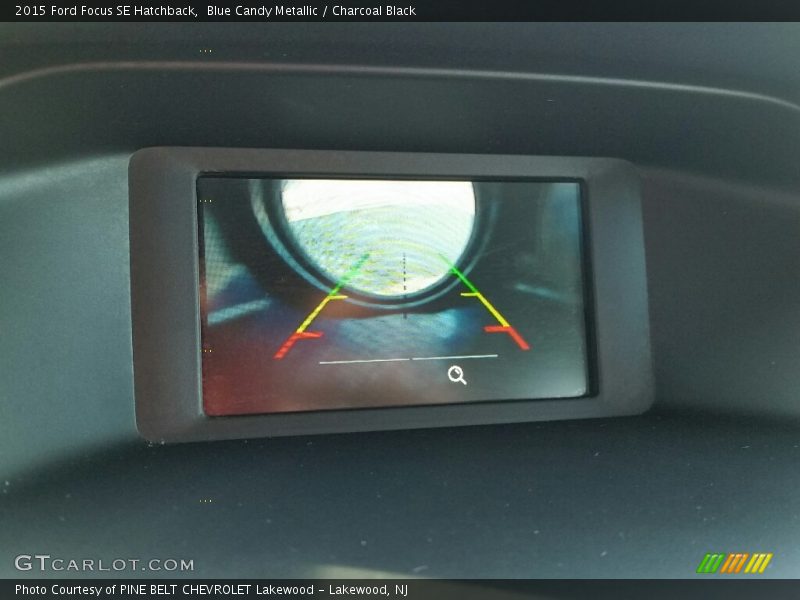 Blue Candy Metallic / Charcoal Black 2015 Ford Focus SE Hatchback