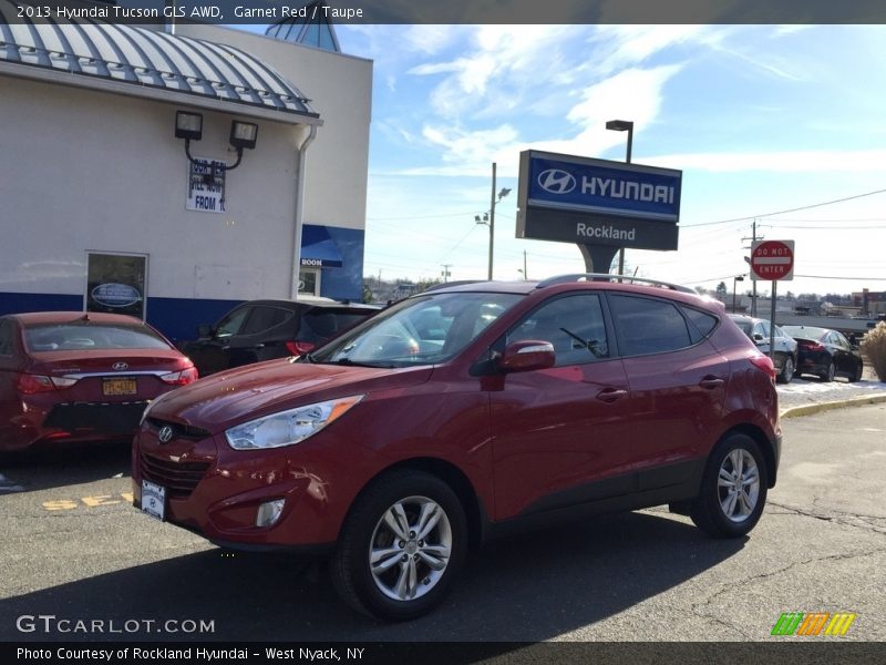 Garnet Red / Taupe 2013 Hyundai Tucson GLS AWD