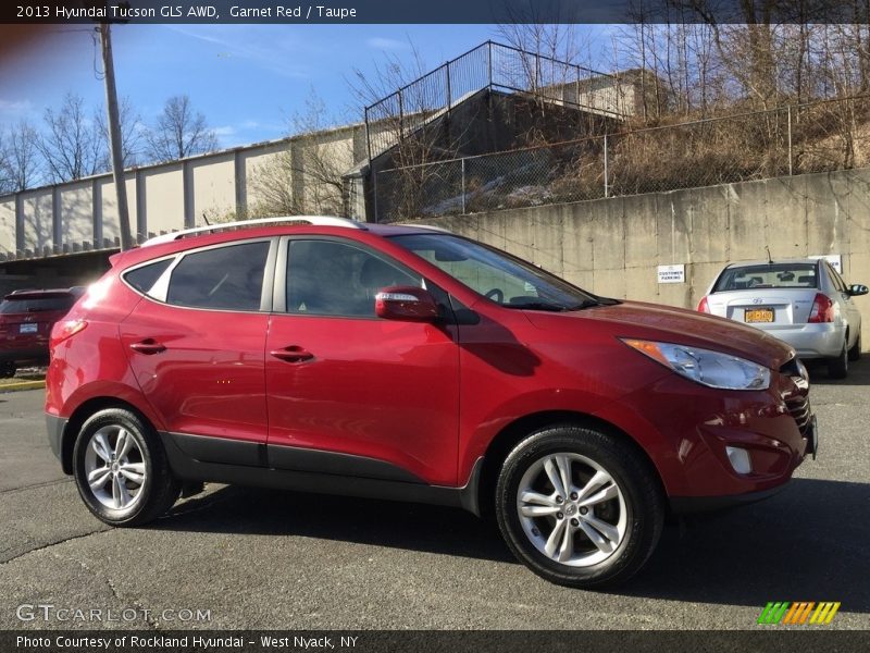 Garnet Red / Taupe 2013 Hyundai Tucson GLS AWD