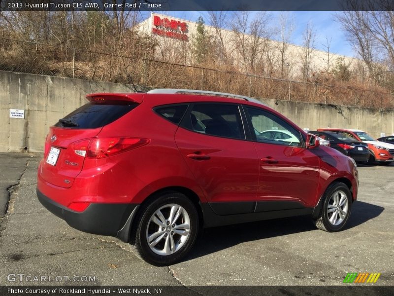 Garnet Red / Taupe 2013 Hyundai Tucson GLS AWD