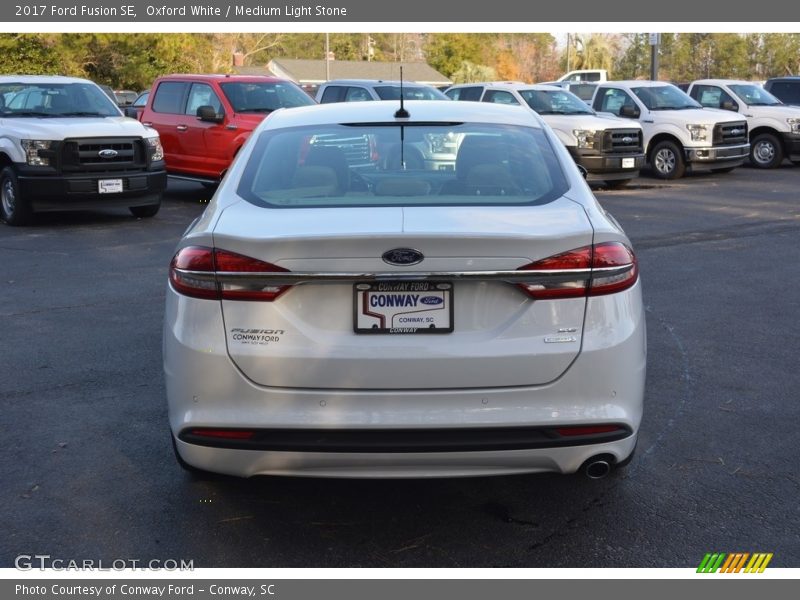 Oxford White / Medium Light Stone 2017 Ford Fusion SE