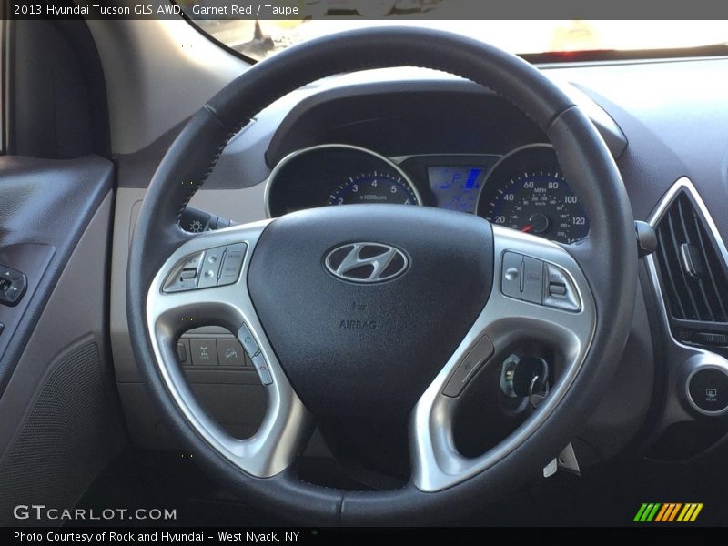 Garnet Red / Taupe 2013 Hyundai Tucson GLS AWD