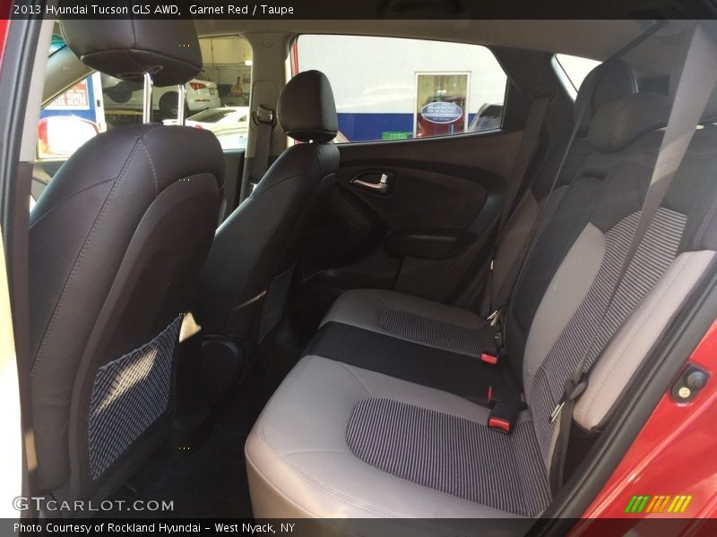 Garnet Red / Taupe 2013 Hyundai Tucson GLS AWD