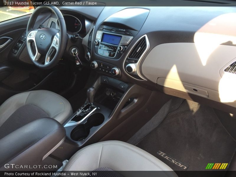Garnet Red / Taupe 2013 Hyundai Tucson GLS AWD