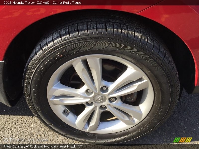 Garnet Red / Taupe 2013 Hyundai Tucson GLS AWD