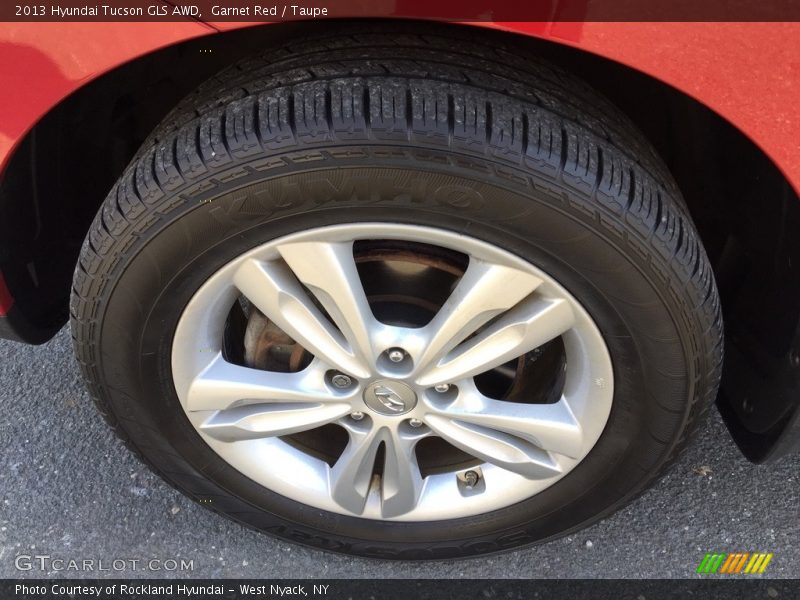 Garnet Red / Taupe 2013 Hyundai Tucson GLS AWD