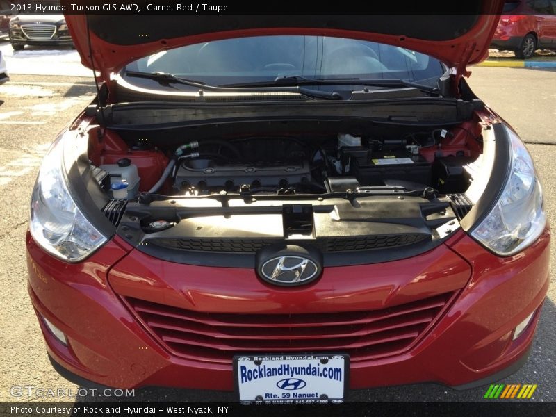 Garnet Red / Taupe 2013 Hyundai Tucson GLS AWD