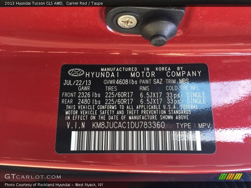 Garnet Red / Taupe 2013 Hyundai Tucson GLS AWD