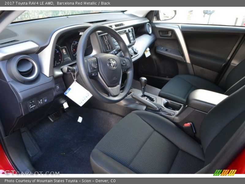 Barcelona Red Metallic / Black 2017 Toyota RAV4 LE AWD