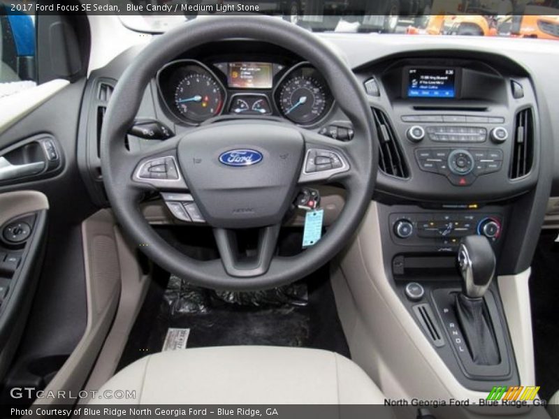 Blue Candy / Medium Light Stone 2017 Ford Focus SE Sedan
