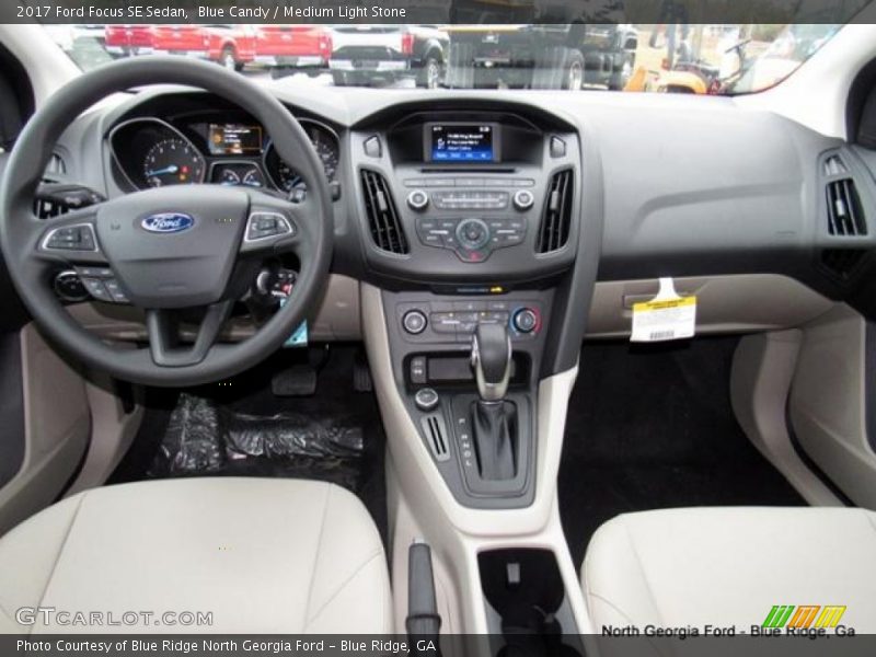 Blue Candy / Medium Light Stone 2017 Ford Focus SE Sedan