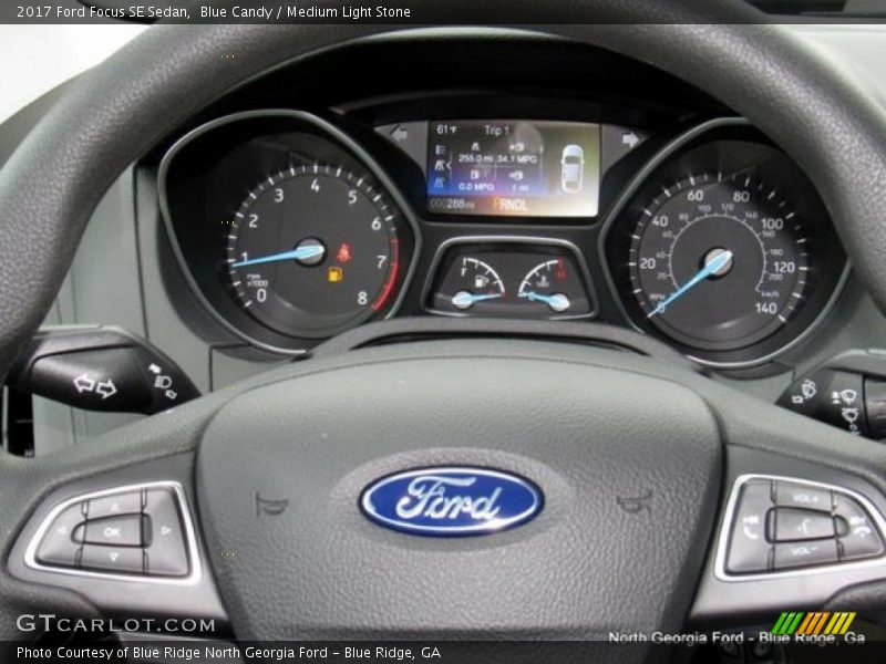 Blue Candy / Medium Light Stone 2017 Ford Focus SE Sedan