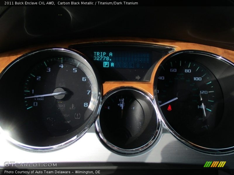 Carbon Black Metallic / Titanium/Dark Titanium 2011 Buick Enclave CXL AWD