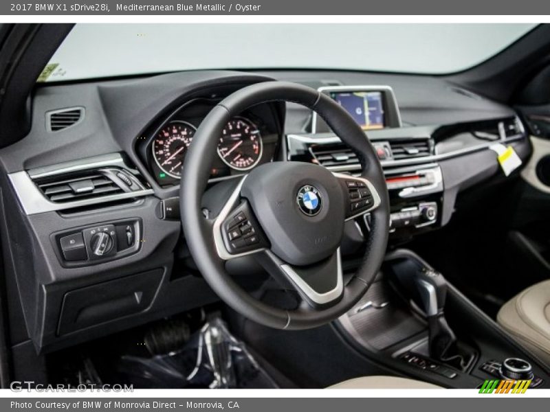 Mediterranean Blue Metallic / Oyster 2017 BMW X1 sDrive28i