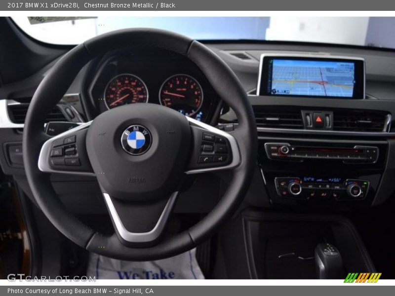 Chestnut Bronze Metallic / Black 2017 BMW X1 xDrive28i