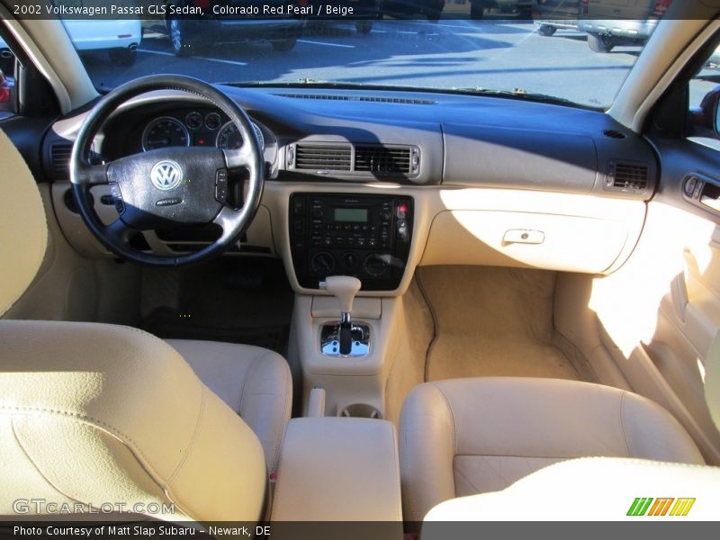 Colorado Red Pearl / Beige 2002 Volkswagen Passat GLS Sedan