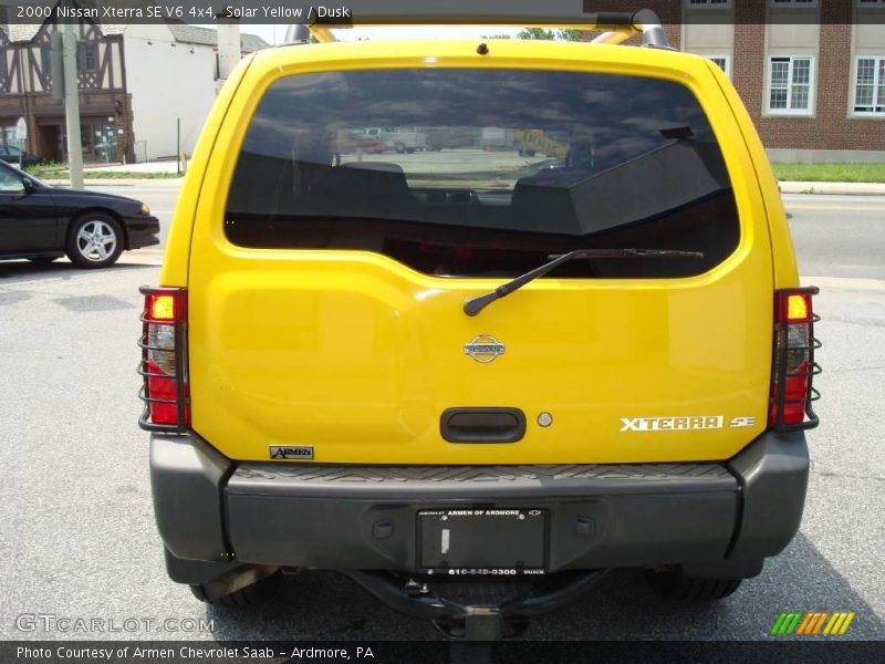Solar Yellow / Dusk 2000 Nissan Xterra SE V6 4x4