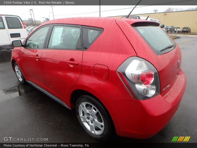 Red Hot Metallic / Ebony 2009 Pontiac Vibe 2.4
