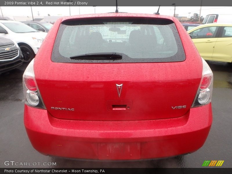 Red Hot Metallic / Ebony 2009 Pontiac Vibe 2.4